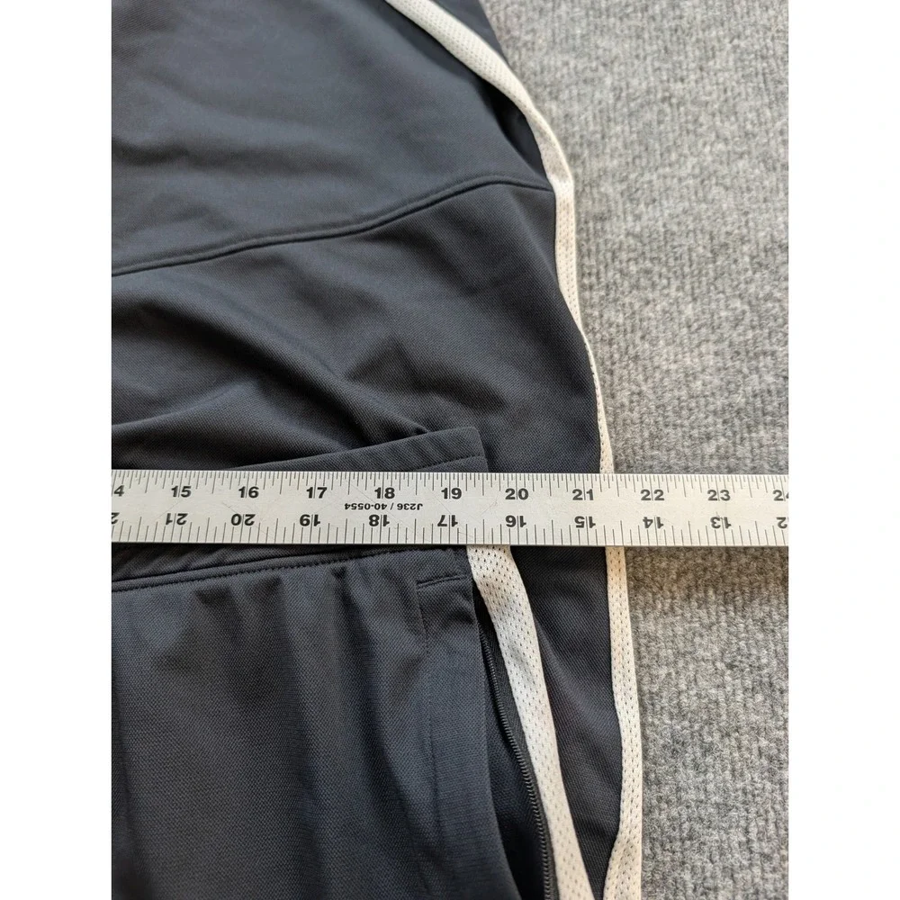 Under Armour Mens Track Pants Size 2XL Black White Stripe Ankle Zippers 1313201